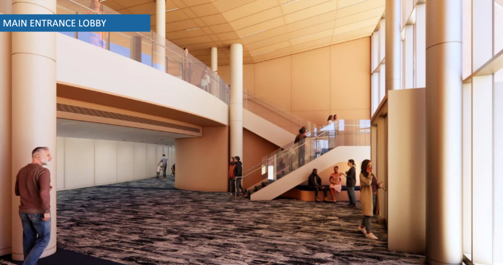 Architectural rendering of the main entrance lobby at the new Loretto Heights Theatre, showing a sweeping staircase and open upper level where a future suspended artwork will hang.