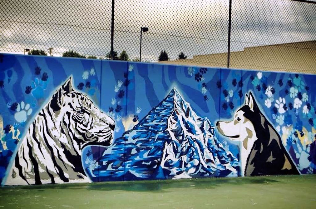 Go to the Untitled (white tiger and wolf viewing each other) page